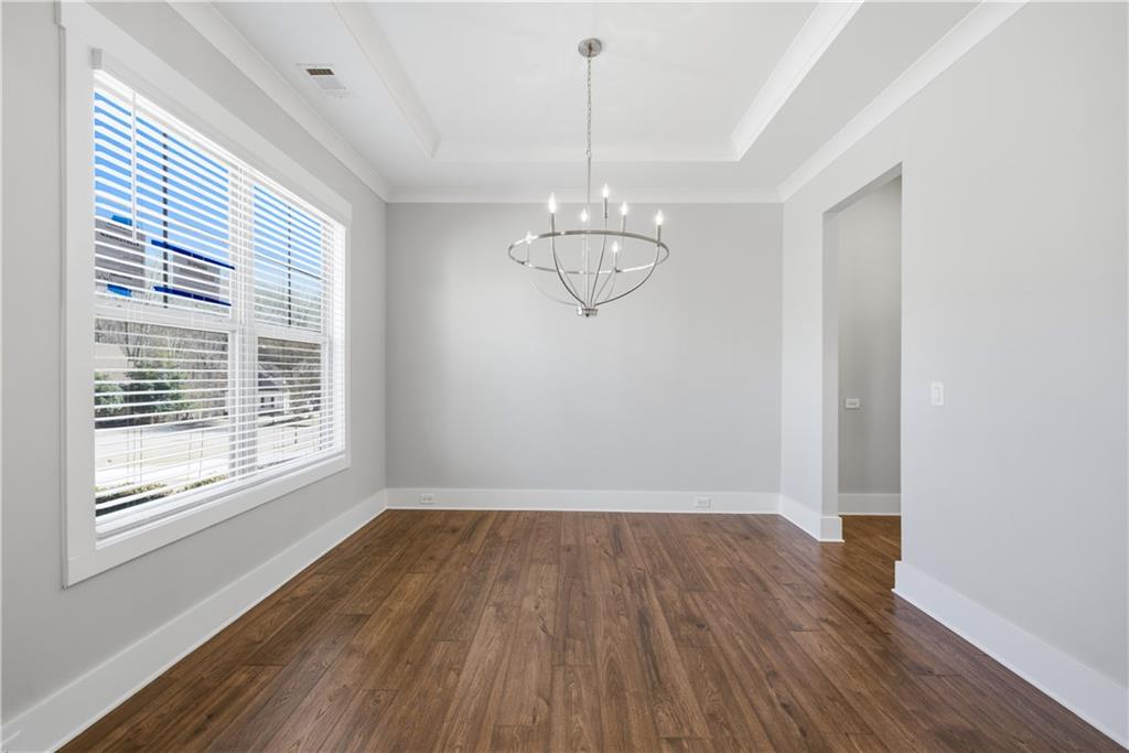 5706 Meadow View Drive Jefferson, GA 30549 - Photo 7 of 47 a view of empty room with wooden floor and fan
