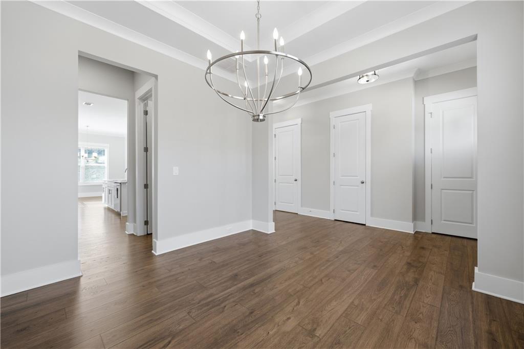 5706 Meadow View Drive Jefferson, GA 30549 - Photo 9 of 47 a view of an empty room with wooden floor