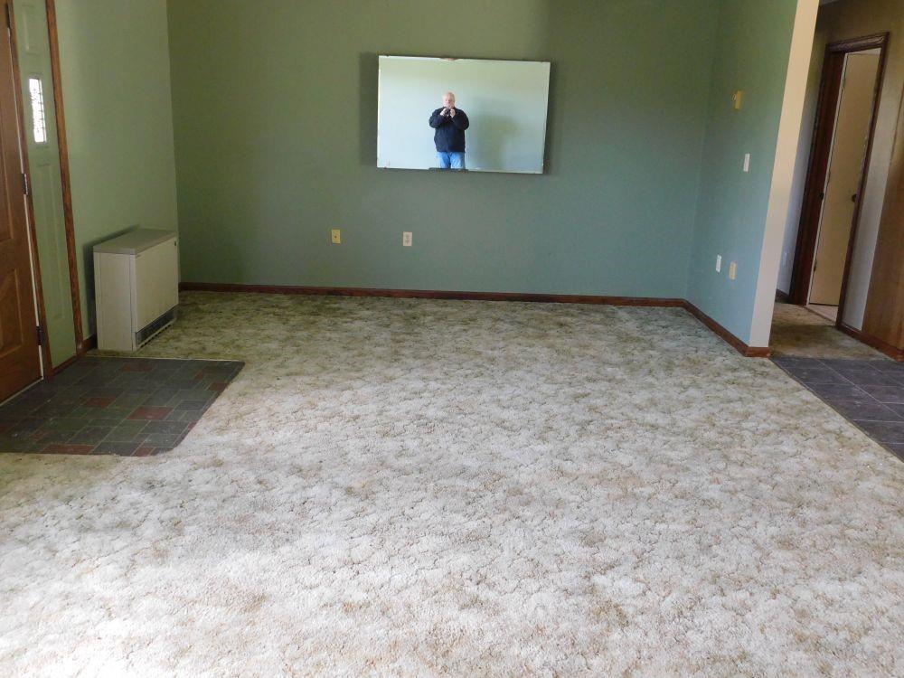 19403 Adamsville Road Cochranton, PA 16314 - Photo 3 of 13 a view of a room with a hallway