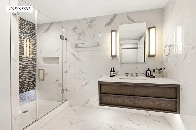 a view of a livingroom with furniture and a flat screen tv