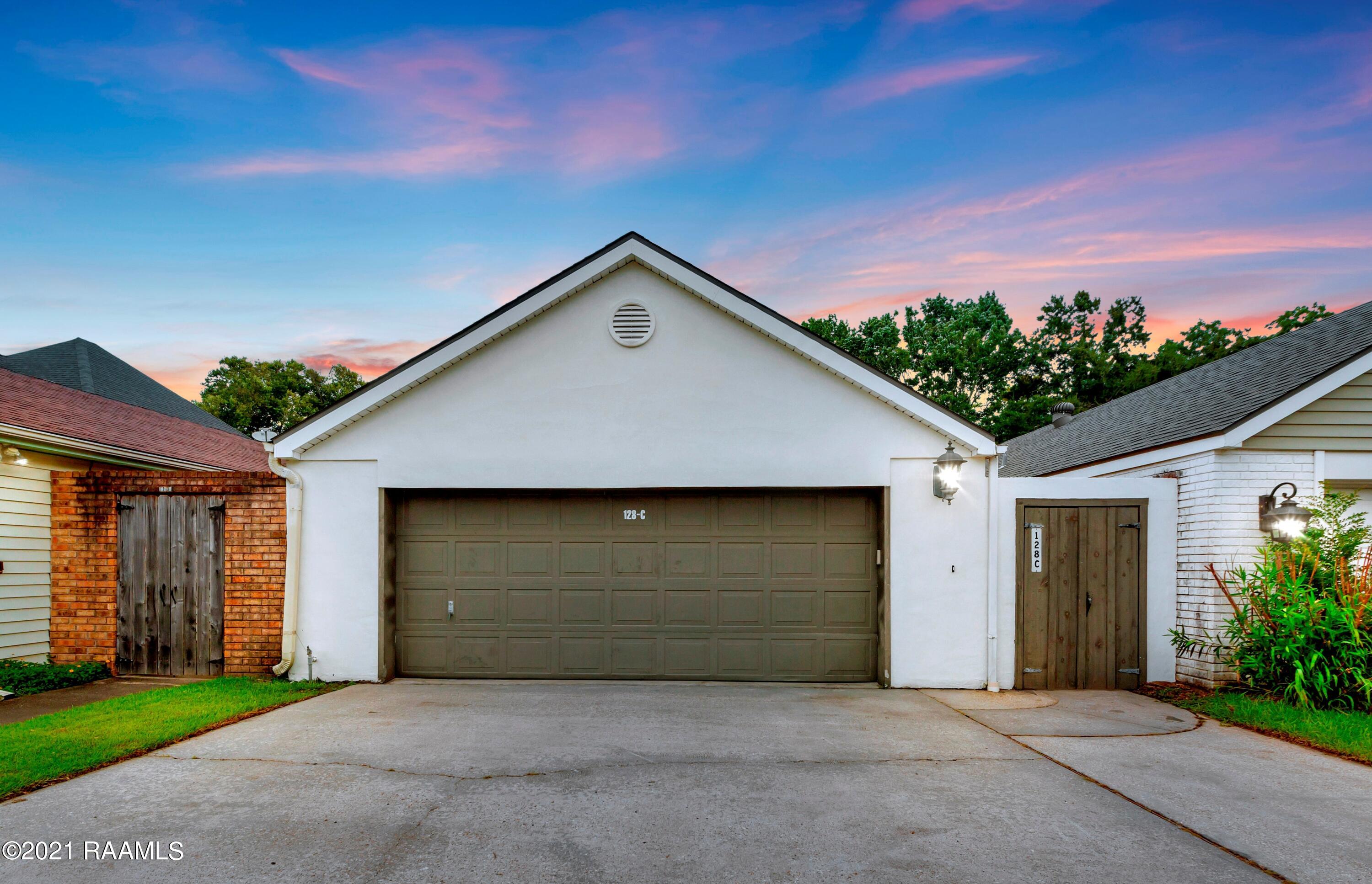 128 Steiner Road, Unit C Lafayette, LA 70508 - Photo 1 of 18 128SteinerC-Twilight