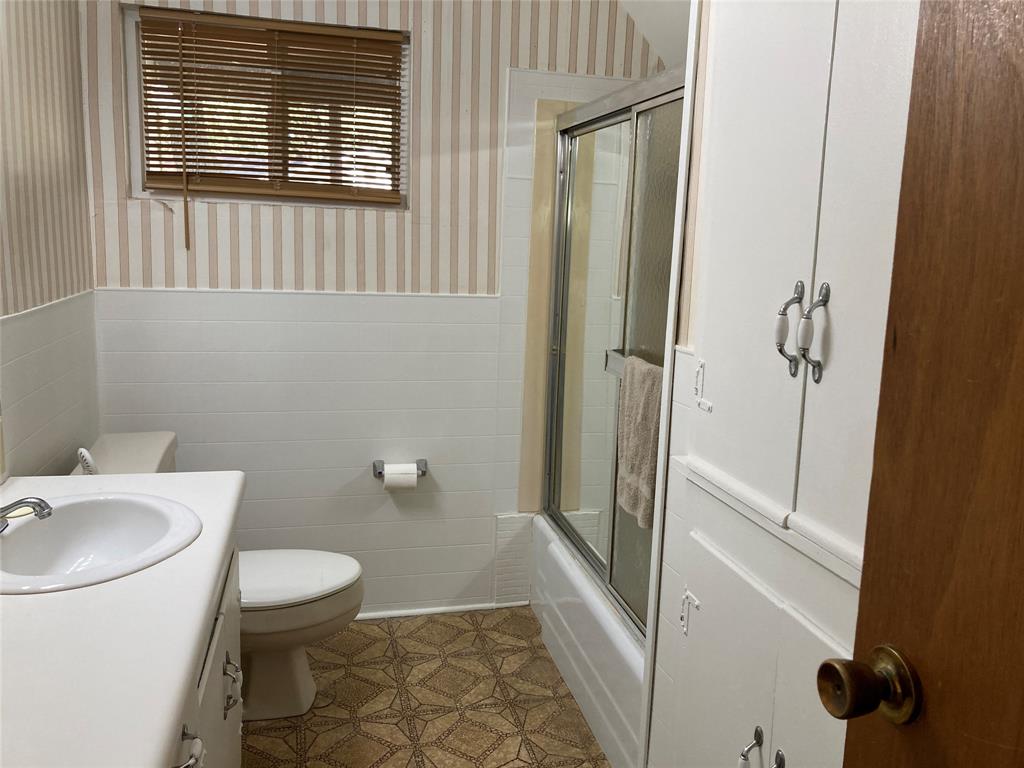 11655 Randle Lane Fort Worth, TX 76179 - Photo 27 of 35 a bathroom with a sink and a toilet