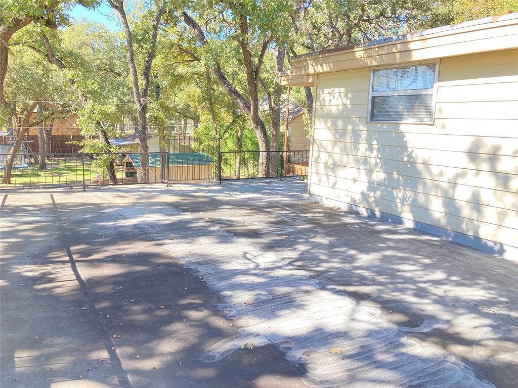 11655 Randle Lane Fort Worth, TX 76179 - Photo 33 of 35 a view of a trees in front of a building