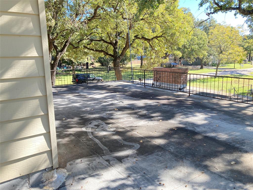 11655 Randle Lane Fort Worth, TX 76179 - Photo 34 of 35 a view of yard with deck and large trees