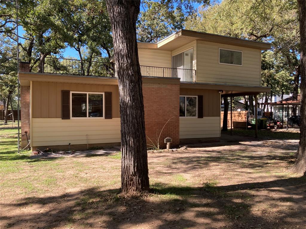 11655 Randle Lane Fort Worth, TX 76179 - Photo 4 of 35 a house that has a tree in front of it