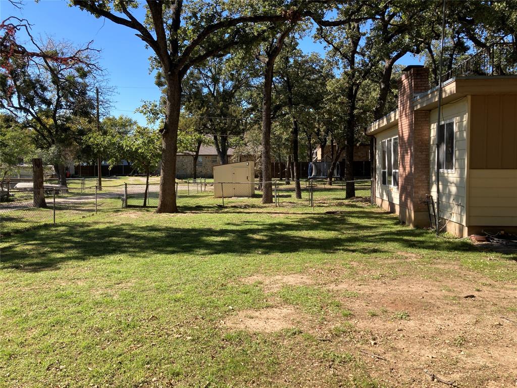 11655 Randle Lane Fort Worth, TX 76179 - Photo 6 of 35 a swimming pool with outdoor seating and yard