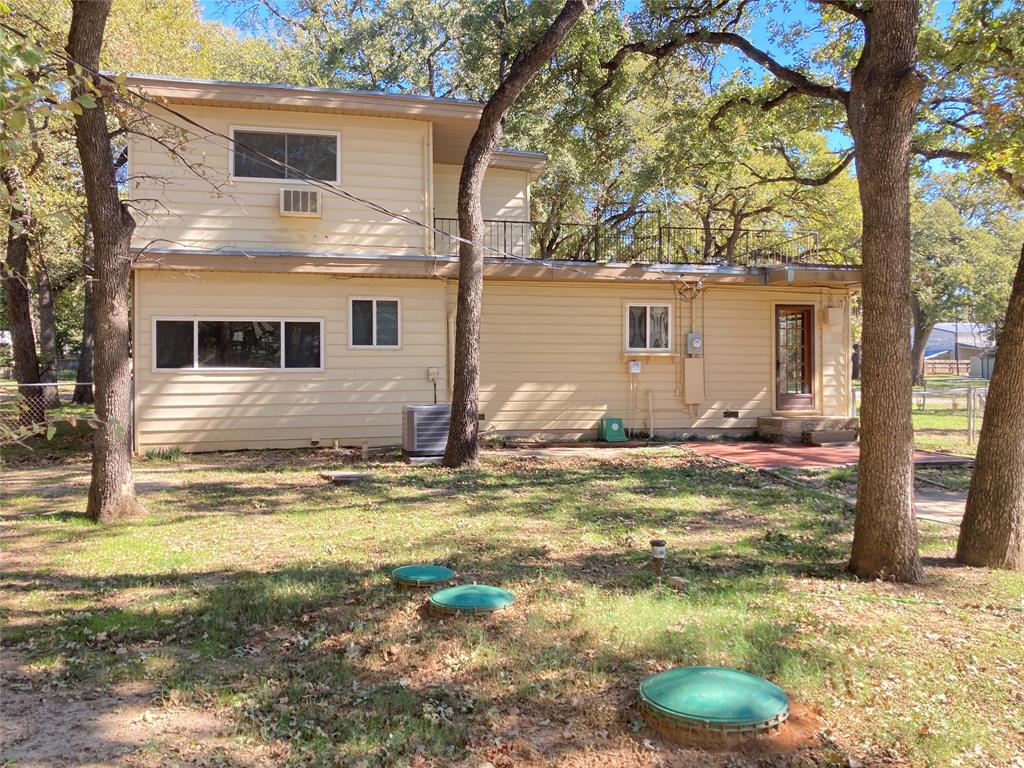 11655 Randle Lane Fort Worth, TX 76179 - Photo 9 of 35 a view of a house with a yard