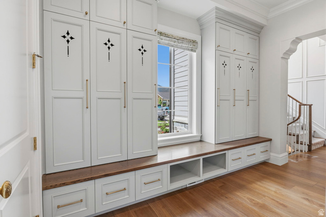 115 East Hidden Ridge Lane, Unit 42 Mapleton, UT 84664 - Photo 36 of 103 Built-in cabinetry with decorative accents, a window seat with wood-finish top, integrated storage drawers, and open shelving