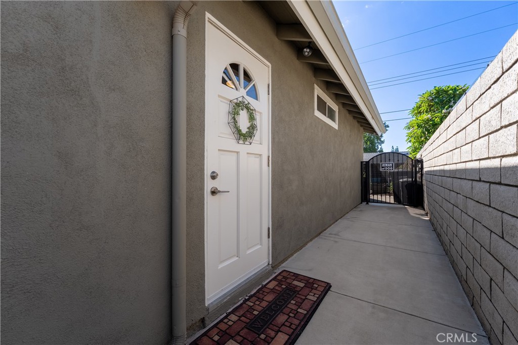 390 North Milford Road Orange, CA 92867 - Photo 41 of 70 Separate ADU entrance from side of house. This allows, any occupant to not have to come through the main home.