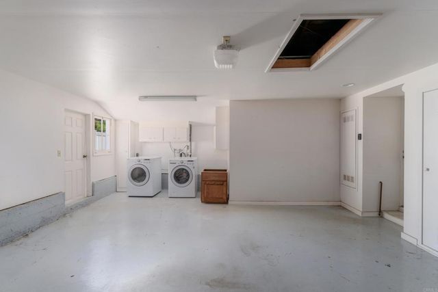 an empty room with entrance and door