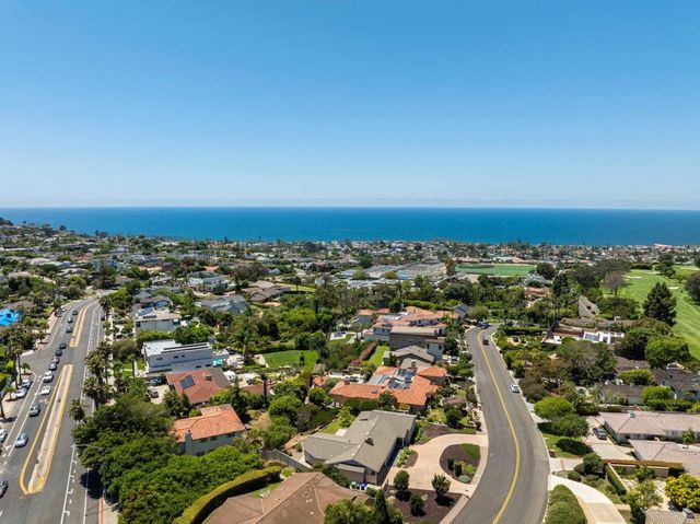 an aerial view of a city with lots of residential buildings