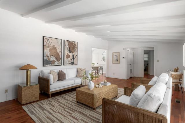 a living room with furniture and a couch