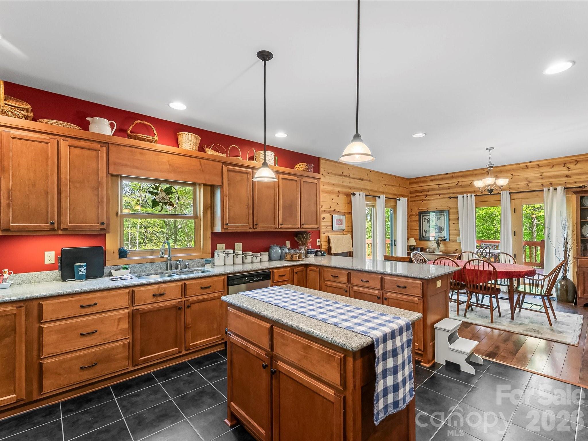 917 Otter Mountain Road Topton, NC 28781 - Photo 17 of 48 a kitchen that has a lot of cabinets in it