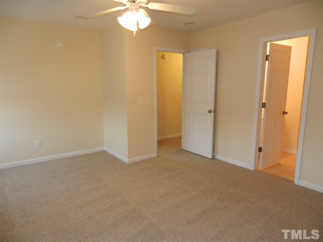 453 Axum Road Willow Spring, NC 27592 - Photo 11 of 17 a view of an empty room