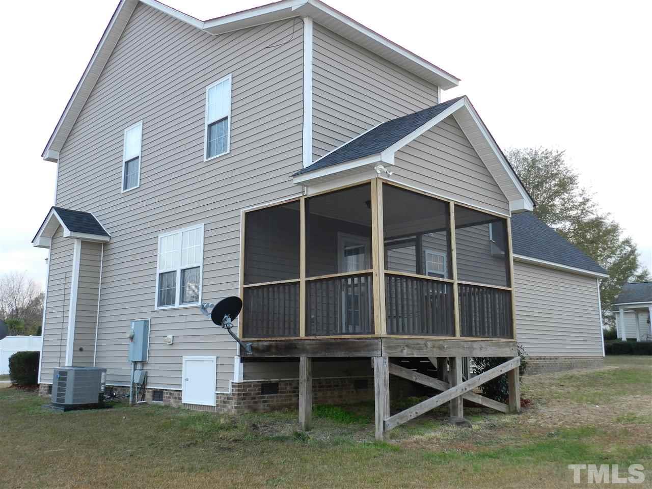 453 Axum Road Willow Spring, NC 27592 - Photo 17 of 17 a backyard of a house