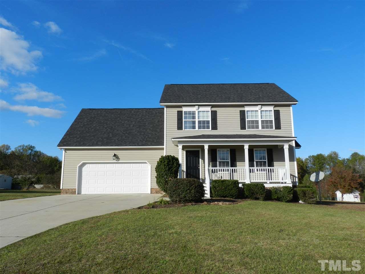 453 Axum Road Willow Spring, NC 27592 - Photo 3 of 17 a house view with a garden space