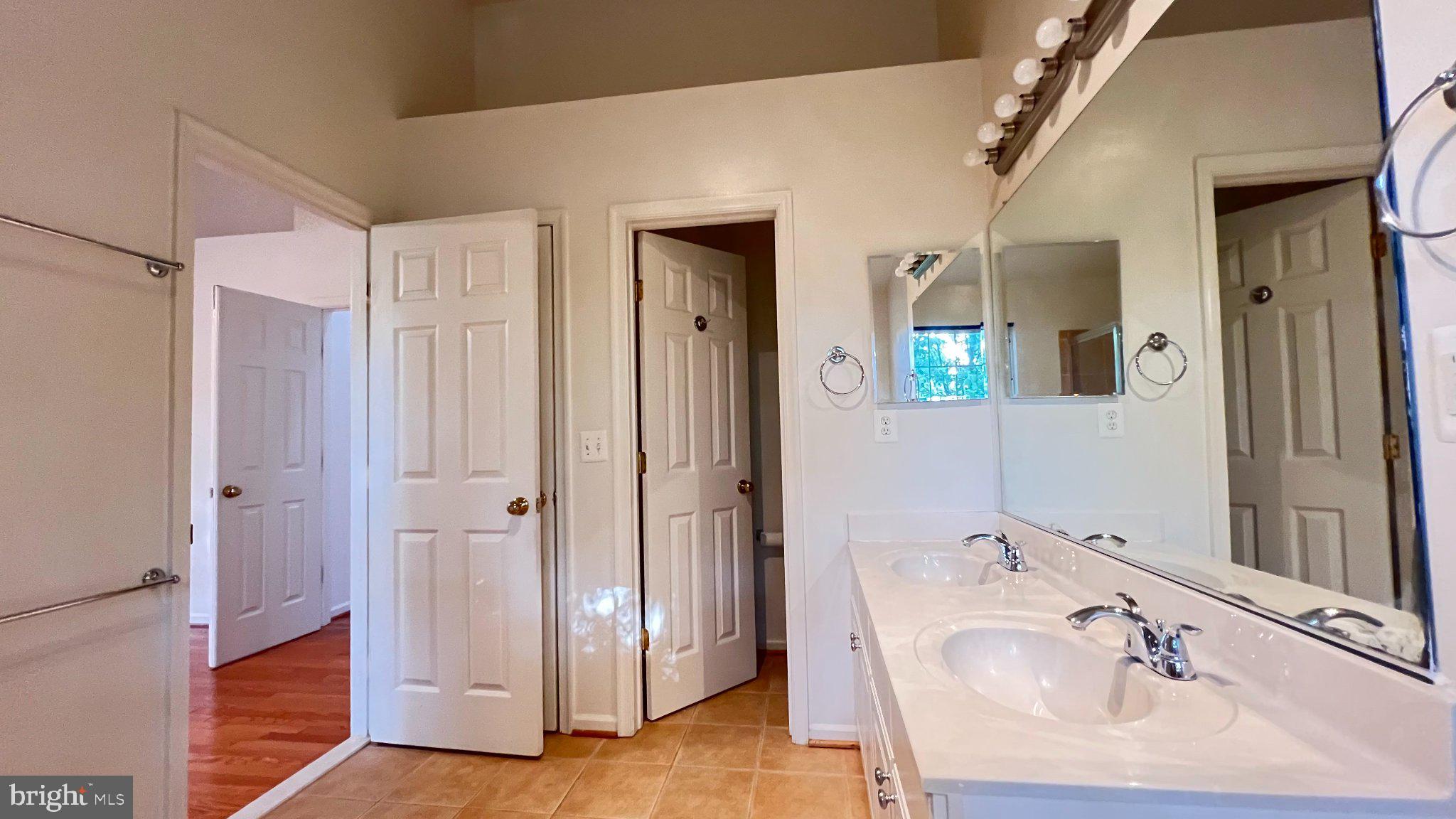 4100 Flower Fairfax, VA 22030 - Photo 18 of 48 Spacious bathroom with natural light.