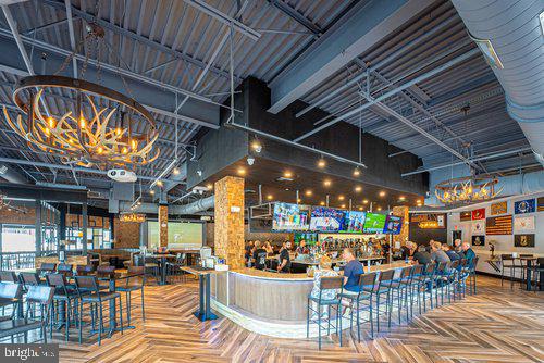 4100 Flower Fairfax, VA 22030 - Photo 46 of 48 Modern bar with vibrant atmosphere.