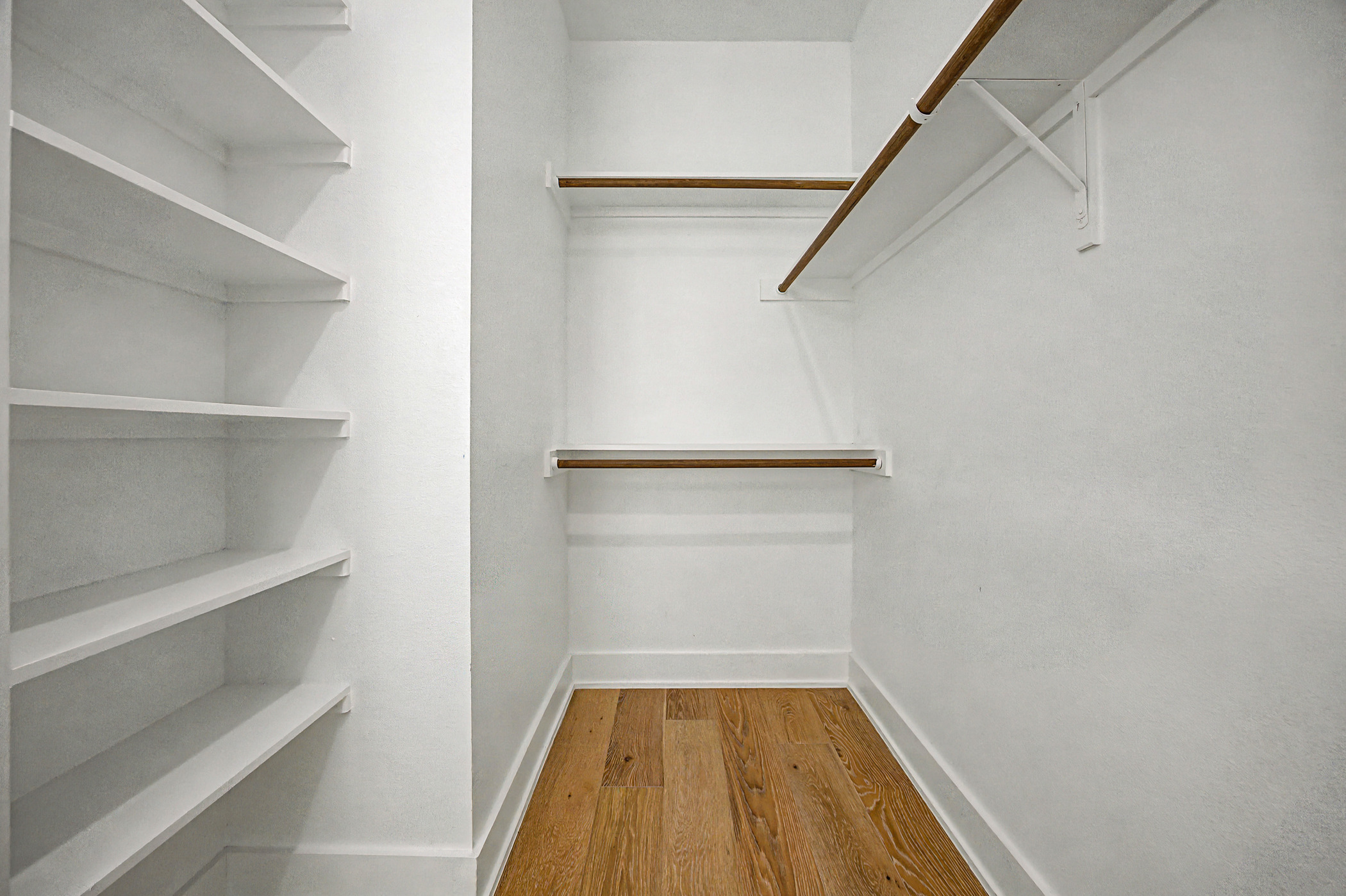 7102 Providence Avenue, Unit 2 Austin, TX 78752 - Photo 14 of 22 a view of a room with wooden floor