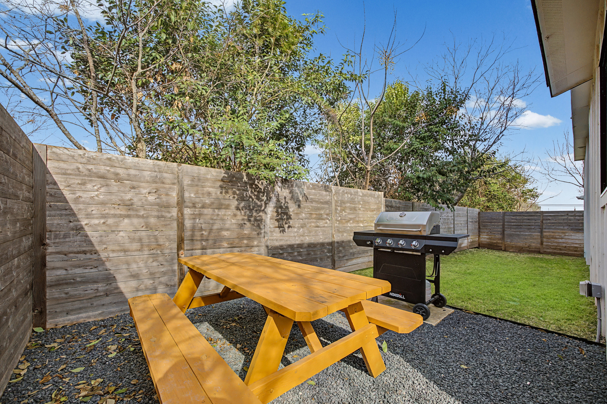 7102 Providence Avenue, Unit 2 Austin, TX 78752 - Photo 21 of 22 a view of a backyard with sitting area