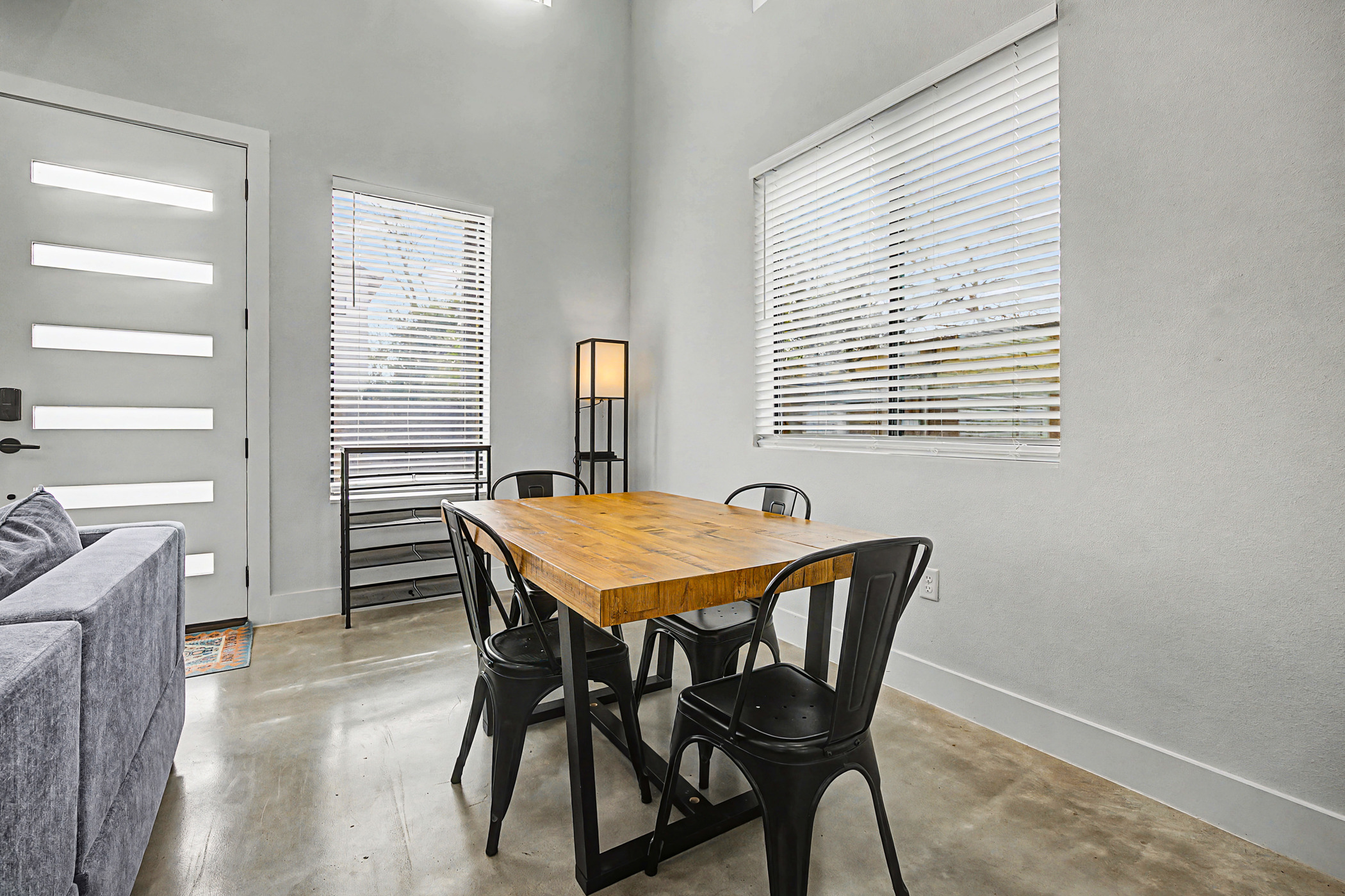 7102 Providence Avenue, Unit 2 Austin, TX 78752 - Photo 8 of 22 a dining room with furniture and window