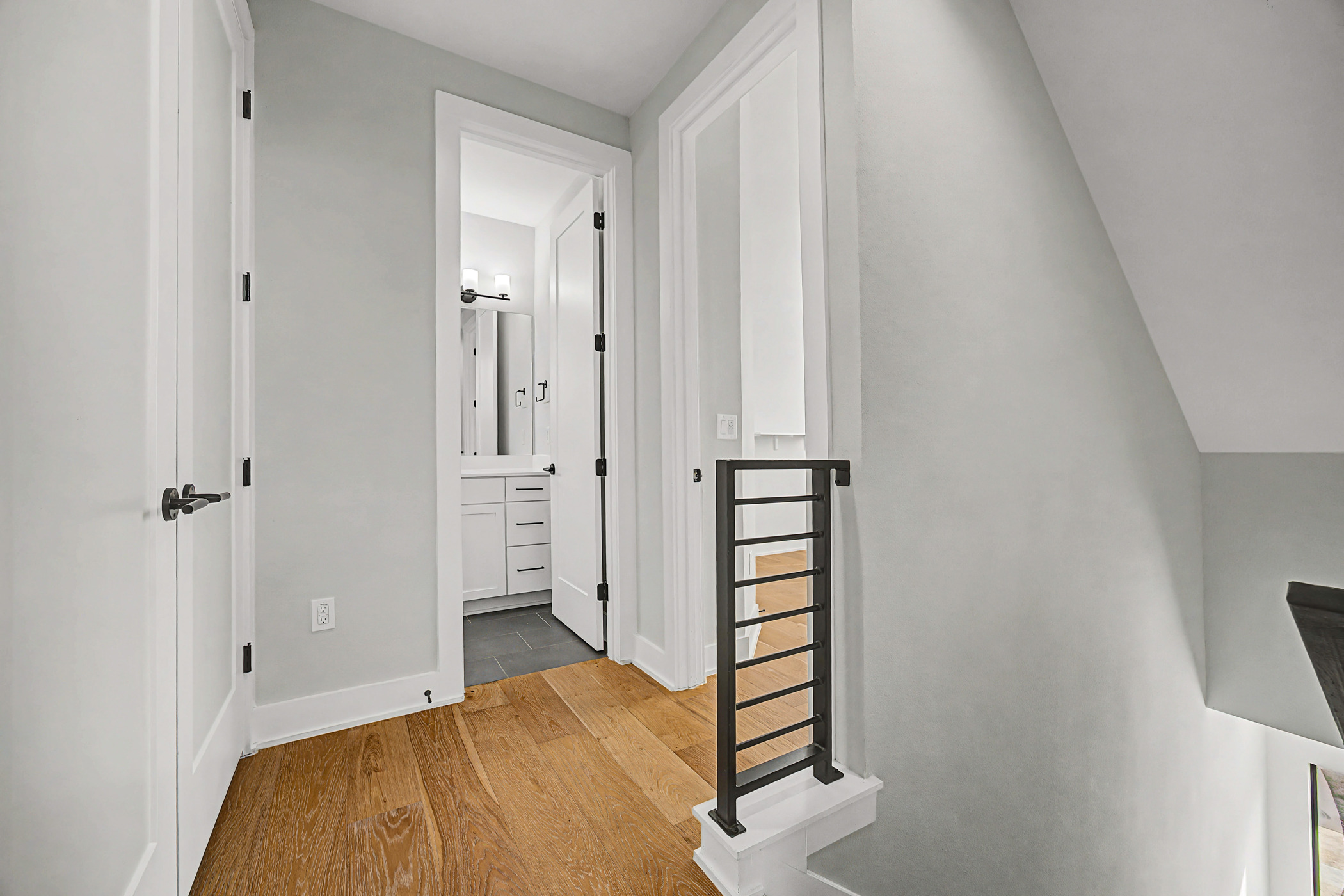 7102 Providence Avenue, Unit 2 Austin, TX 78752 - Photo 10 of 22 a bedroom with a bed and a shower