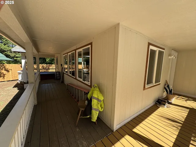 a view of a balcony with flat screen tv
