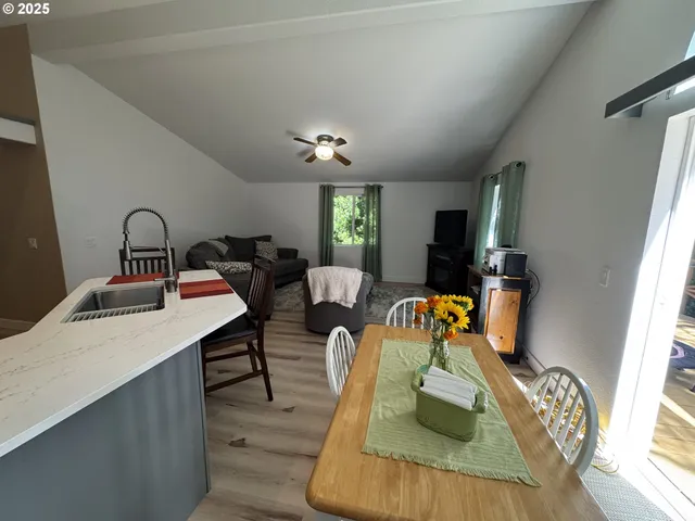 a room with furniture a window and gym equipment