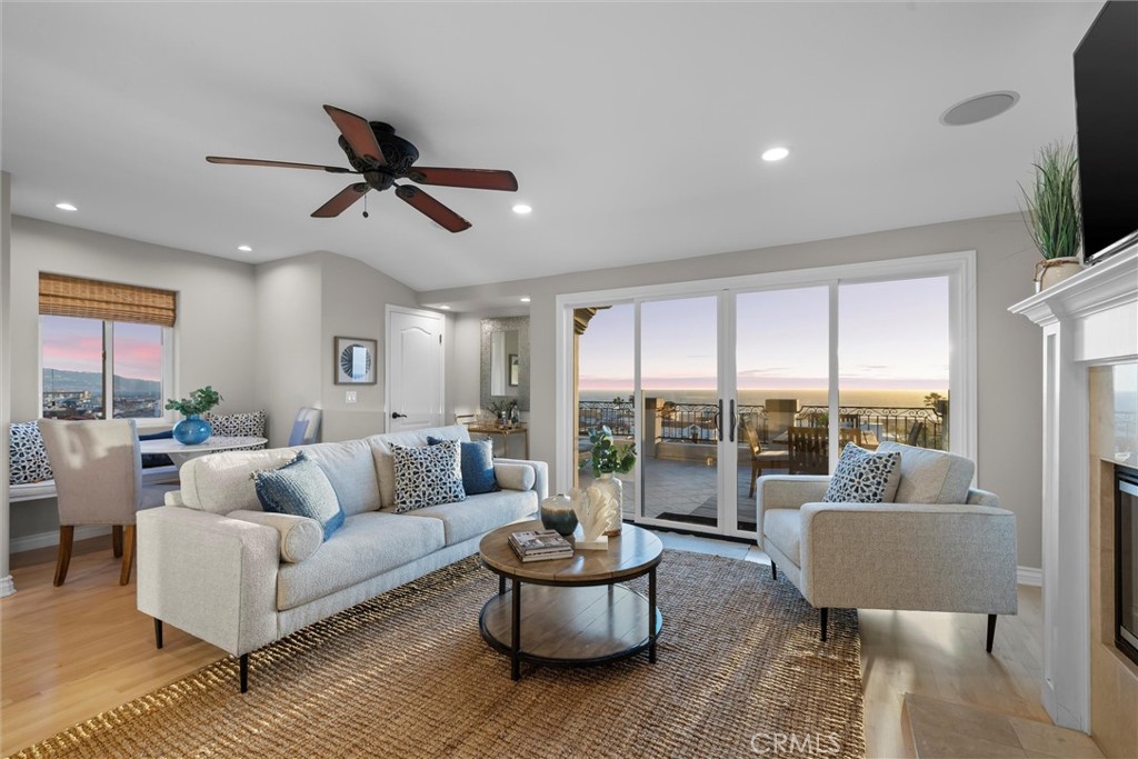 1042 Bayview Drive Hermosa Beach, CA 90254 - Photo 11 of 44 a living room with furniture and a large window