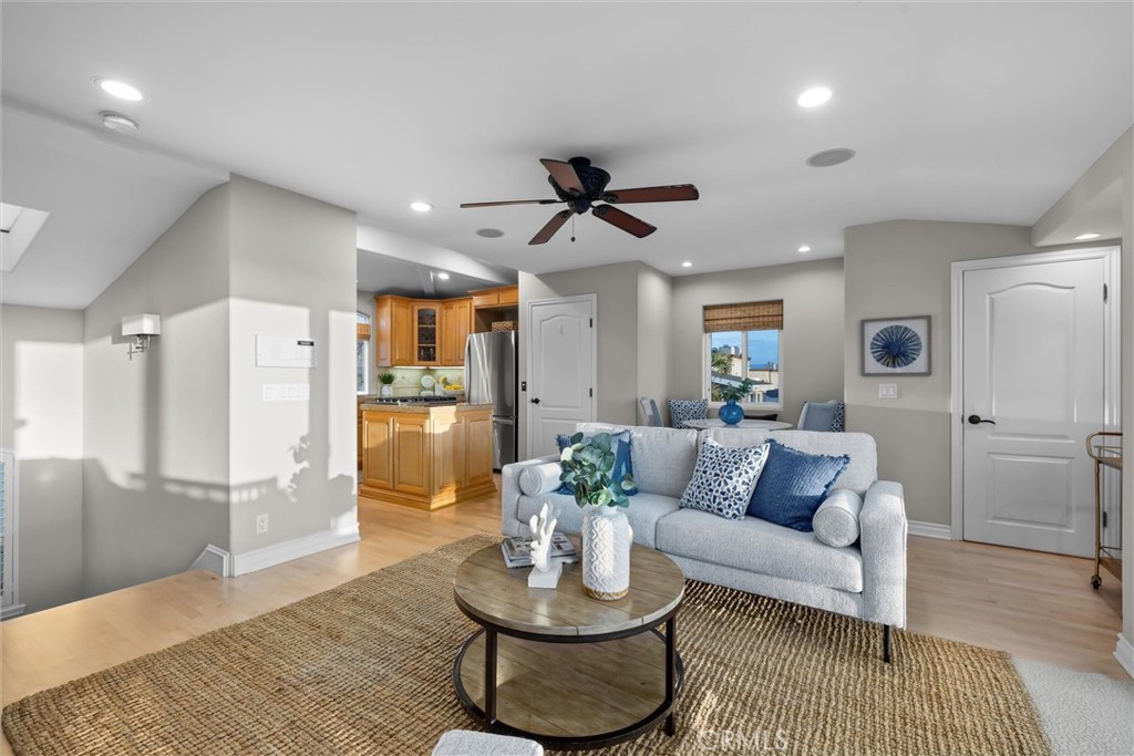 1042 Bayview Drive Hermosa Beach, CA 90254 - Photo 13 of 44 a living room with furniture and a wooden floor