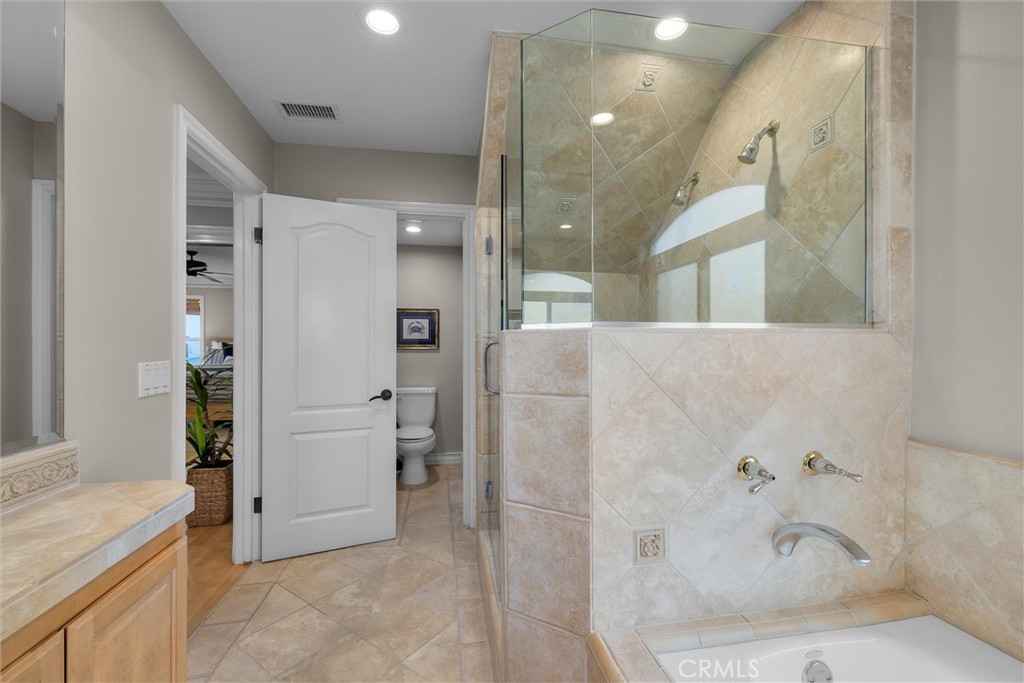 1042 Bayview Drive Hermosa Beach, CA 90254 - Photo 25 of 44 a bathroom with a bathtub and a shower