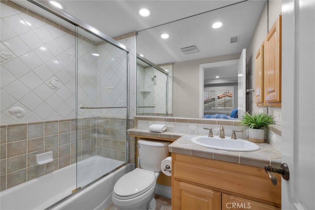 1042 Bayview Drive Hermosa Beach, CA 90254 - Photo 35 of 44 a bathroom with a sink toilet and shower