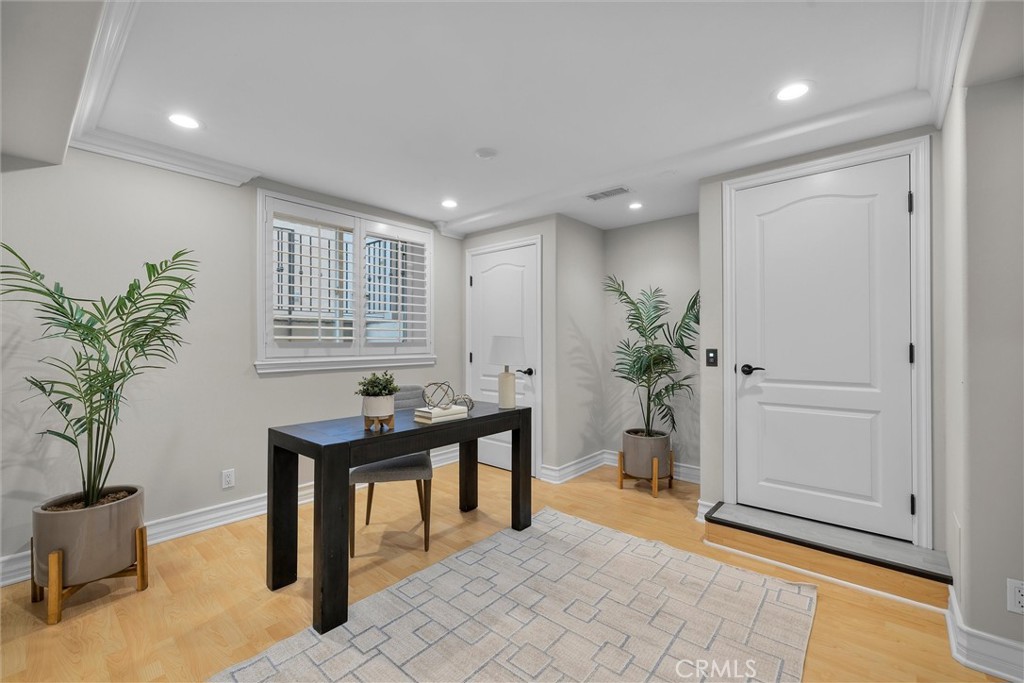 1042 Bayview Drive Hermosa Beach, CA 90254 - Photo 38 of 44 a workspace with furniture and a potted plant
