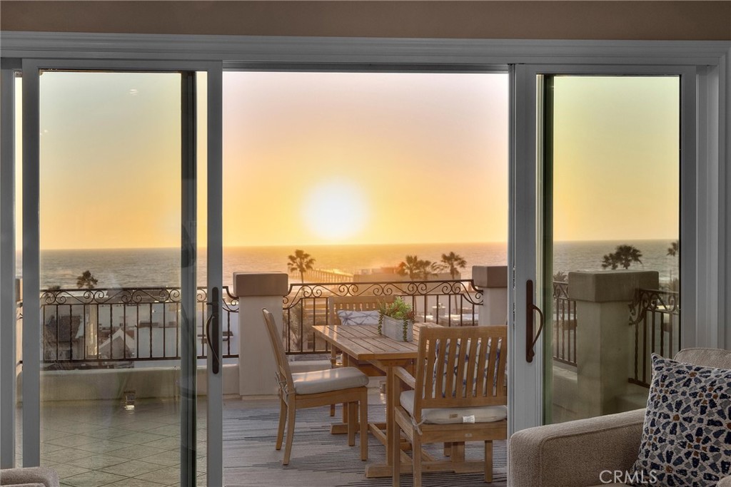 1042 Bayview Drive Hermosa Beach, CA 90254 - Photo 8 of 44 a view of a balcony with table and chairs