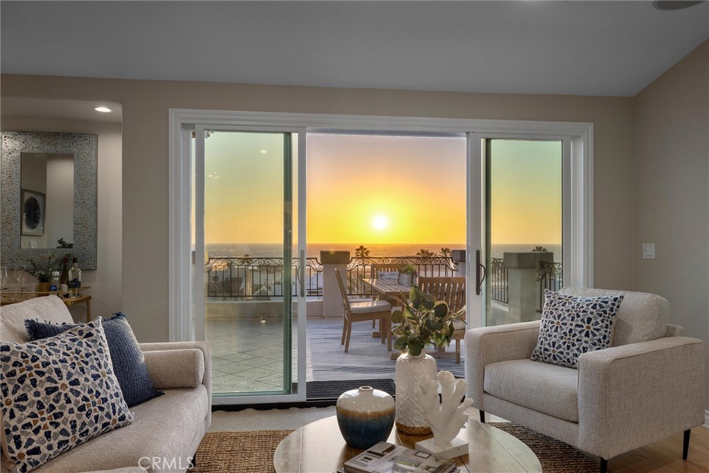 1042 Bayview Drive Hermosa Beach, CA 90254 - Photo 9 of 44 a living room with furniture and a floor to ceiling window