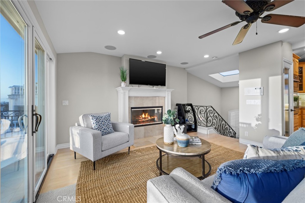 1042 Bayview Drive Hermosa Beach, CA 90254 - Photo 10 of 44 a living room with furniture and a fireplace