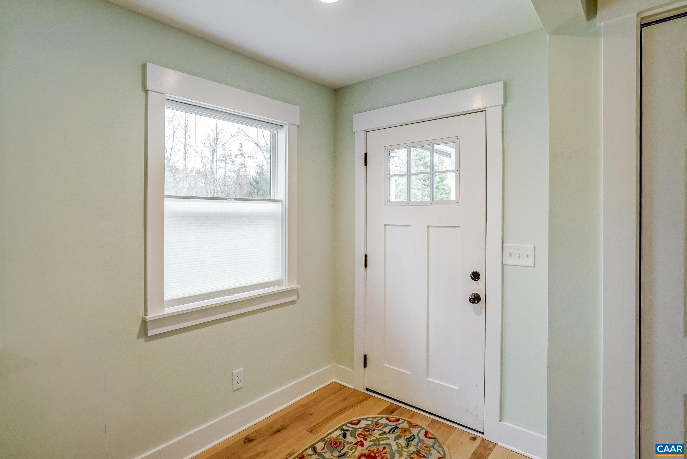 1265 Pounding Creek Road Charlottesville, VA 22903 - Photo 13 of 71 a view of an empty room with a window