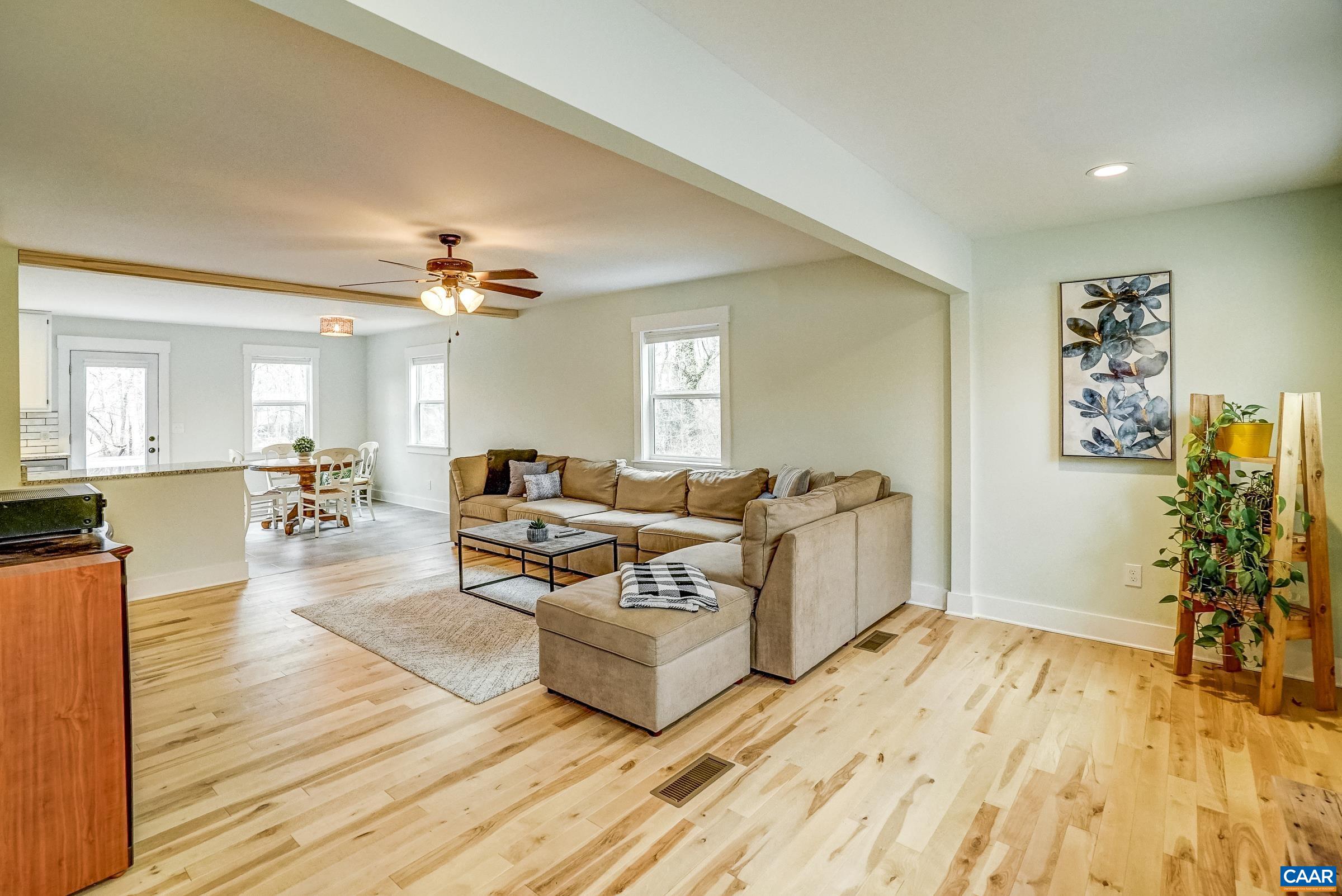 1265 Pounding Creek Road Charlottesville, VA 22903 - Photo 14 of 71 a living room with furniture and a wooden floor