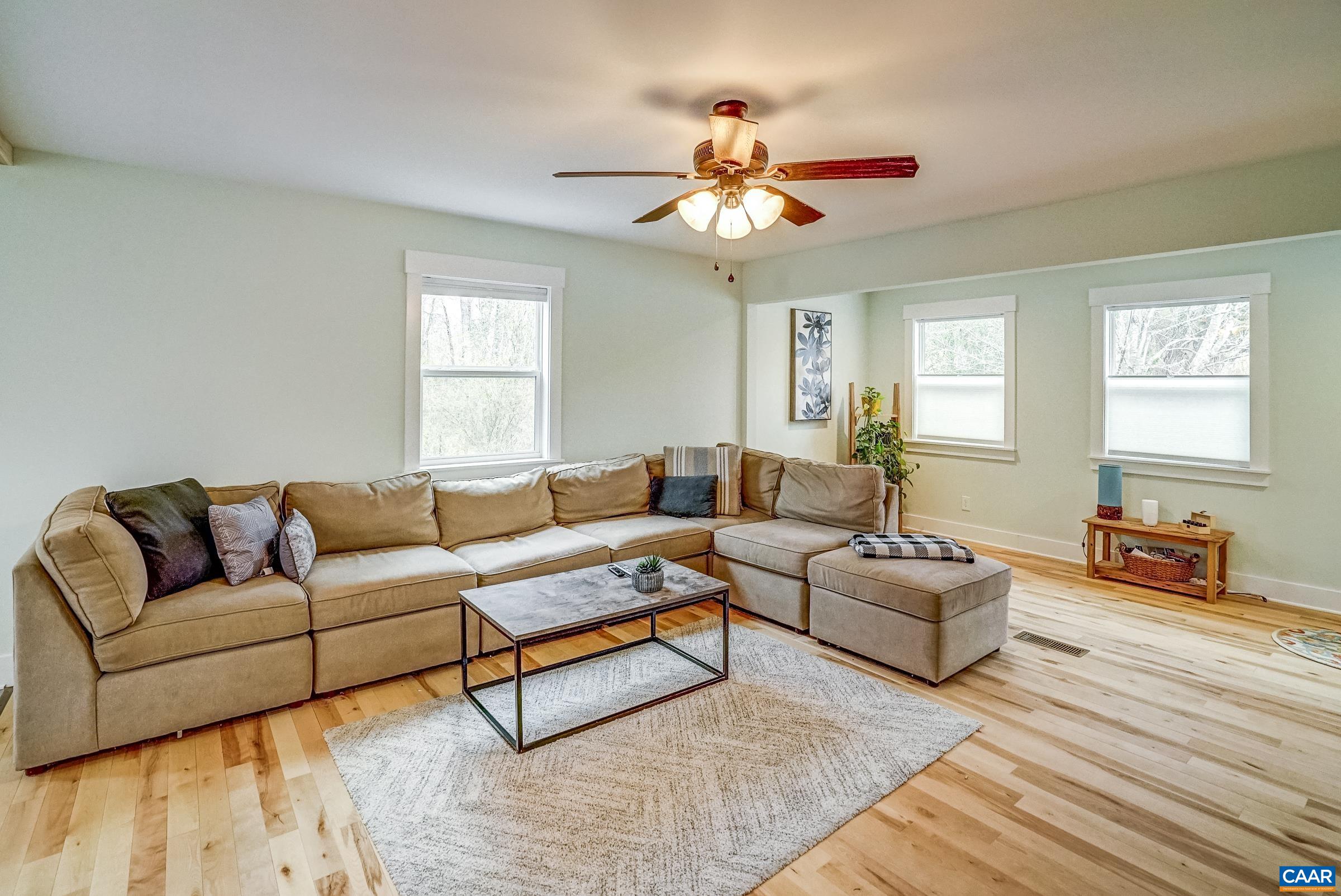 1265 Pounding Creek Road Charlottesville, VA 22903 - Photo 17 of 71 a living room with furniture and a large window
