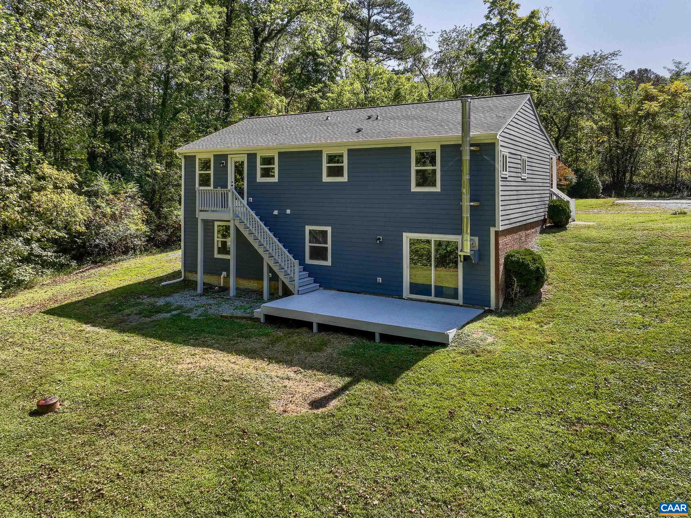 1265 Pounding Creek Road Charlottesville, VA 22903 - Photo 2 of 71 a view of a house with backyard and garden