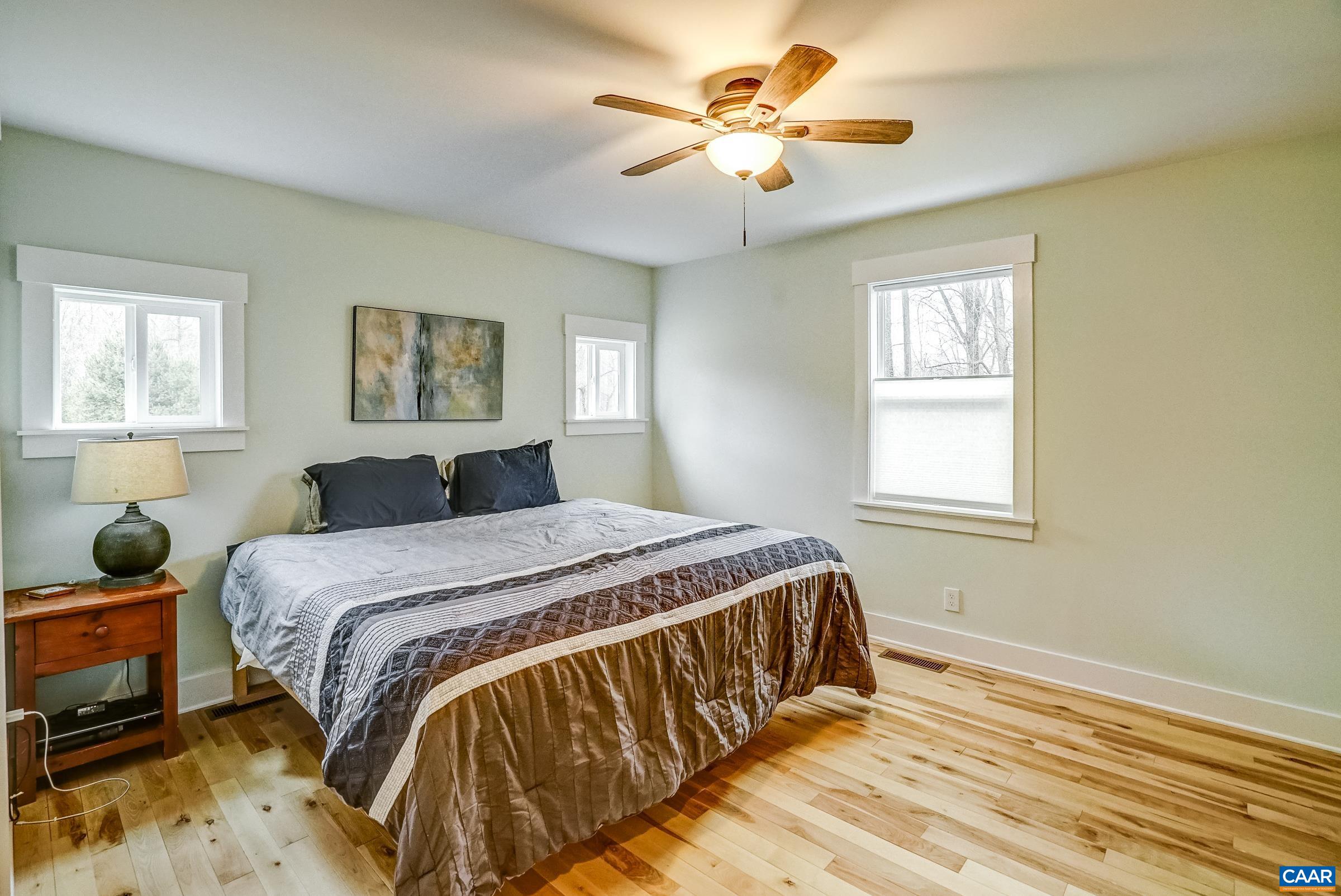 1265 Pounding Creek Road Charlottesville, VA 22903 - Photo 28 of 71 a bedroom with a bed and a window