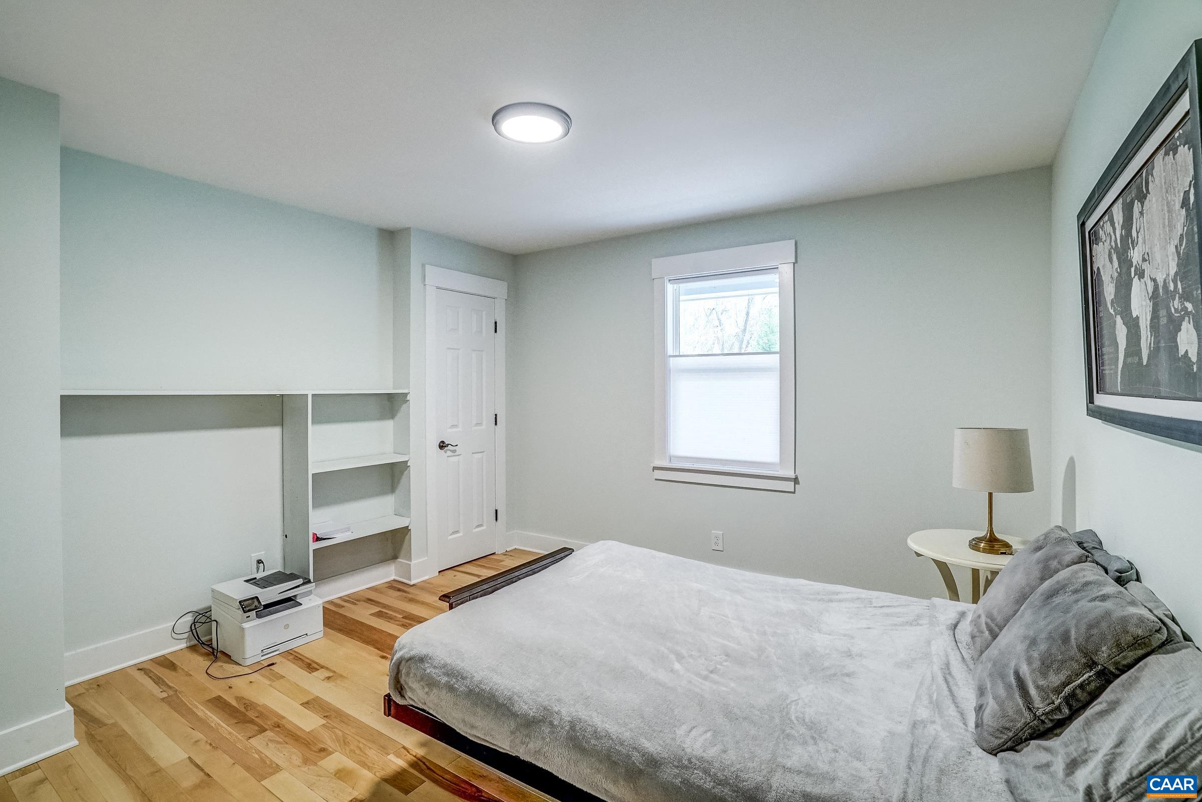 1265 Pounding Creek Road Charlottesville, VA 22903 - Photo 34 of 71 a bedroom with a bed and window