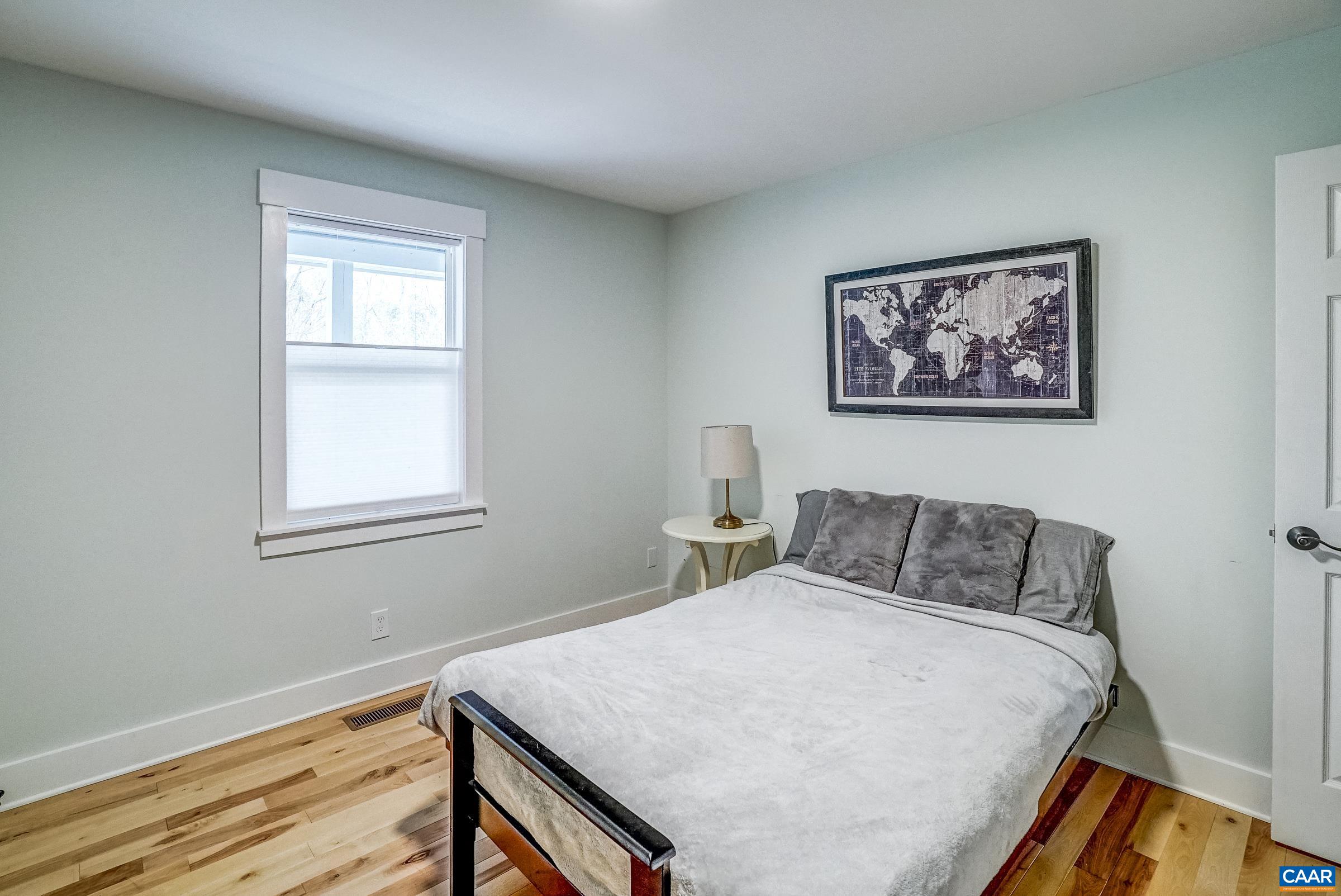 1265 Pounding Creek Road Charlottesville, VA 22903 - Photo 35 of 71 a bedroom with a bed and a window
