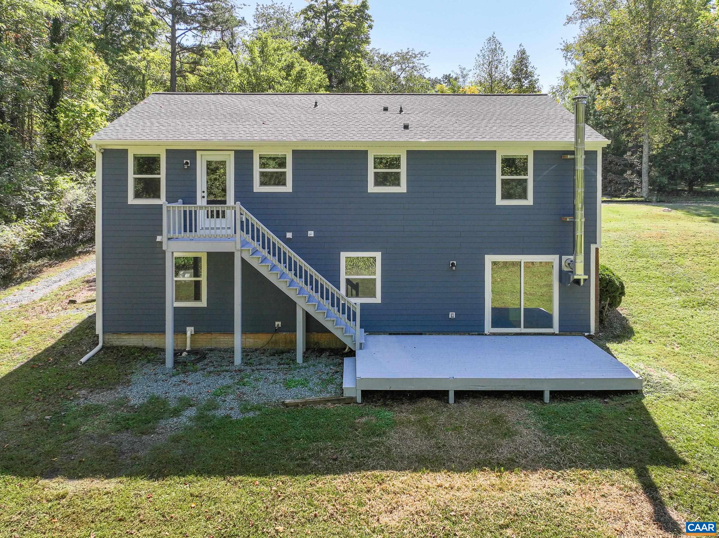1265 Pounding Creek Road Charlottesville, VA 22903 - Photo 52 of 71 a view of a house with a yard