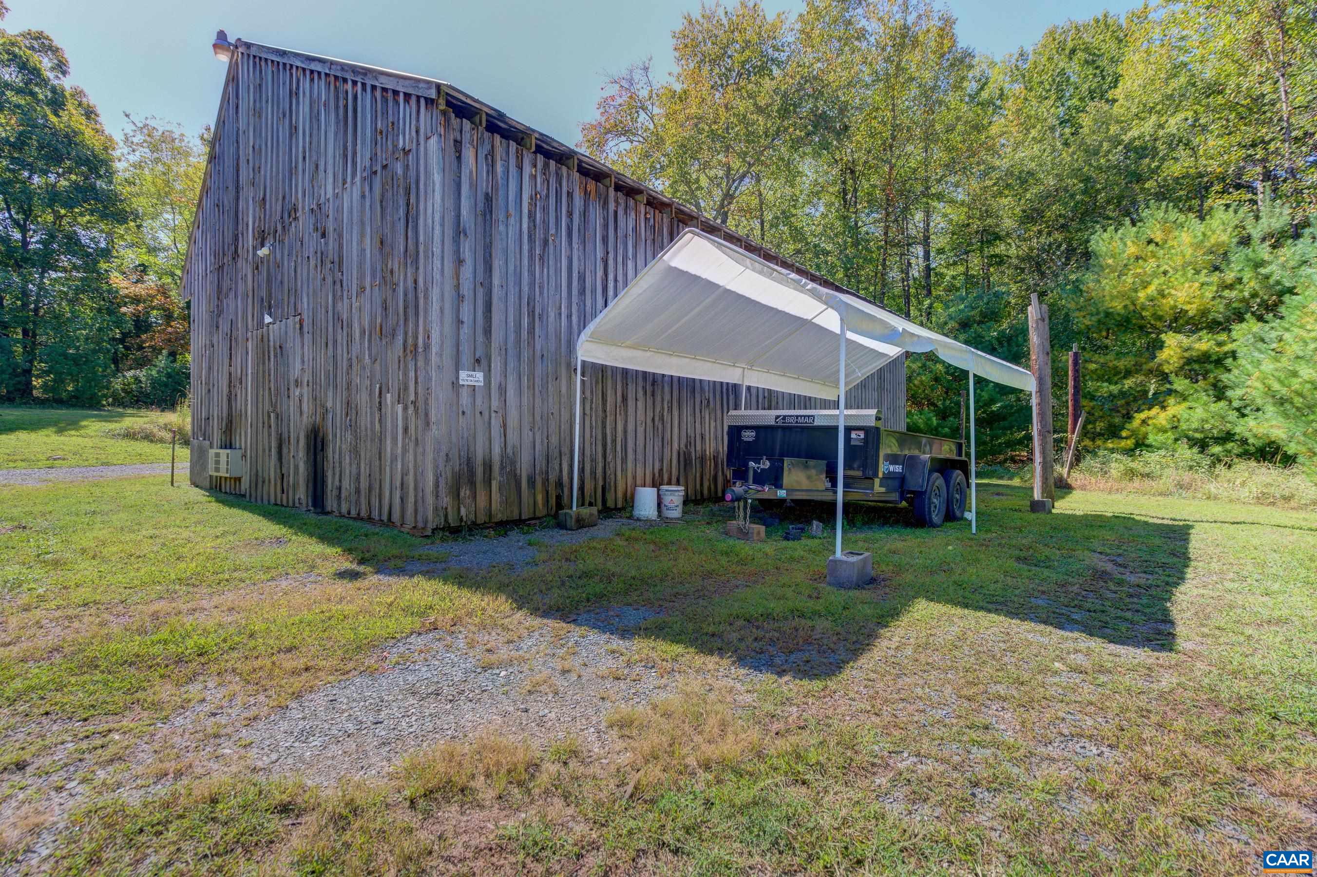 1265 Pounding Creek Road Charlottesville, VA 22903 - Photo 59 of 71 a view of a house with backyard and sitting area