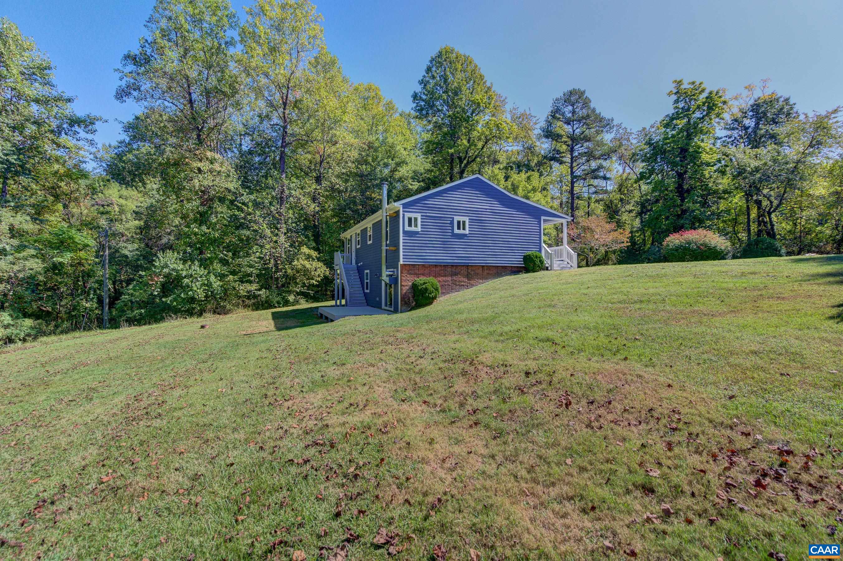 1265 Pounding Creek Road Charlottesville, VA 22903 - Photo 65 of 71 a view of a big yard with large trees