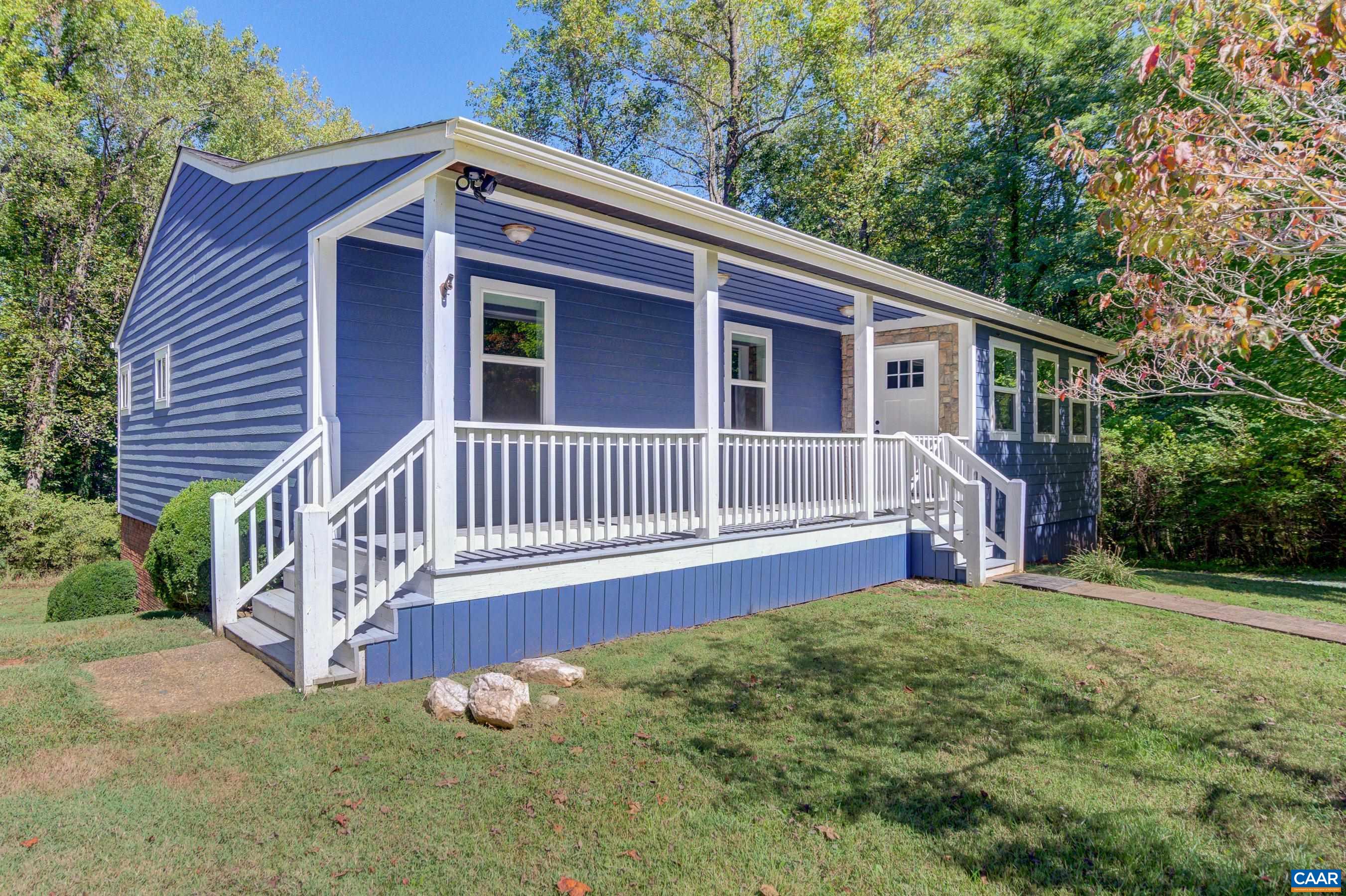1265 Pounding Creek Road Charlottesville, VA 22903 - Photo 66 of 71 a view of a house with a yard and deck