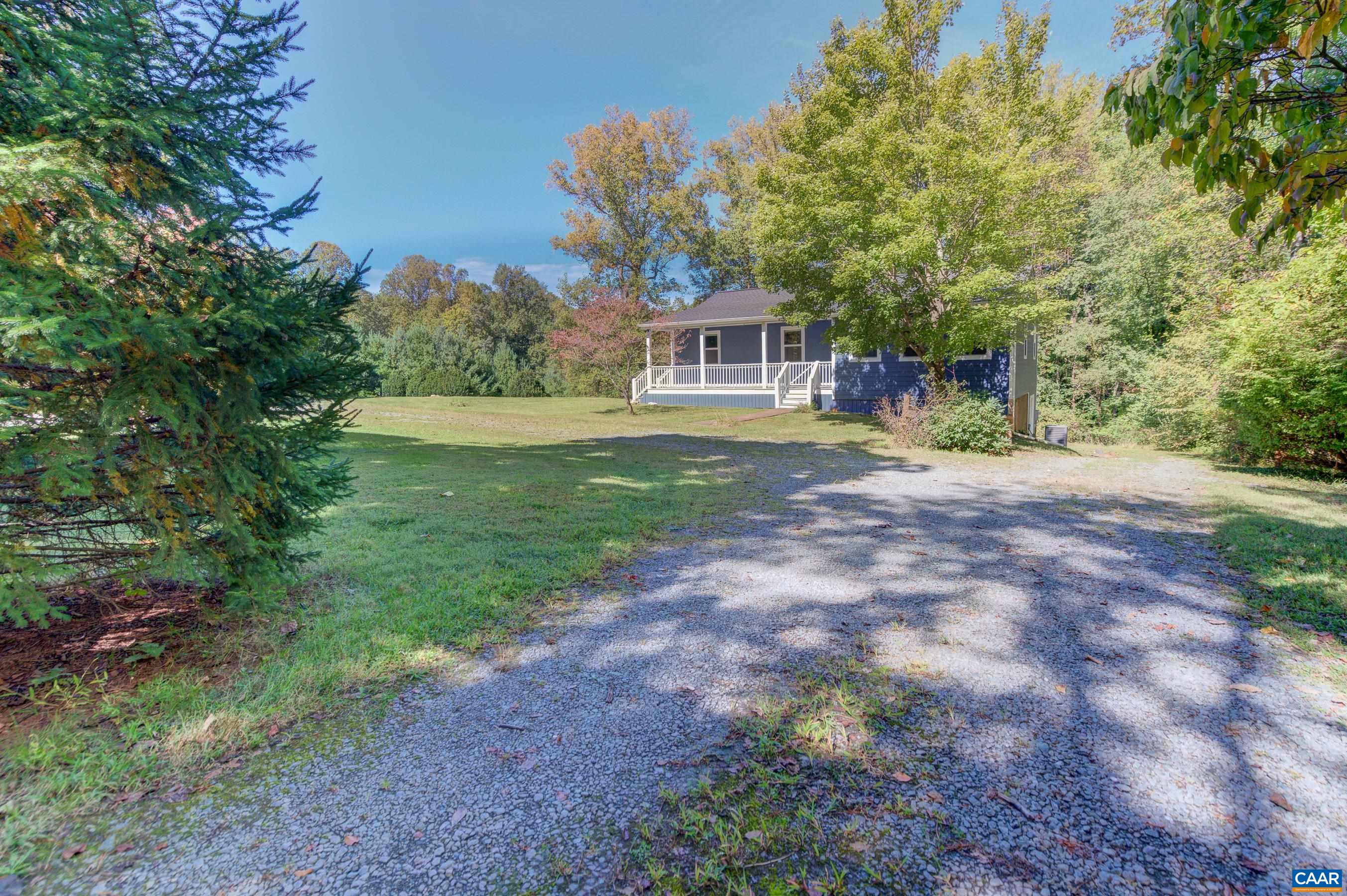 1265 Pounding Creek Road Charlottesville, VA 22903 - Photo 67 of 71 a front view of a house with a yard