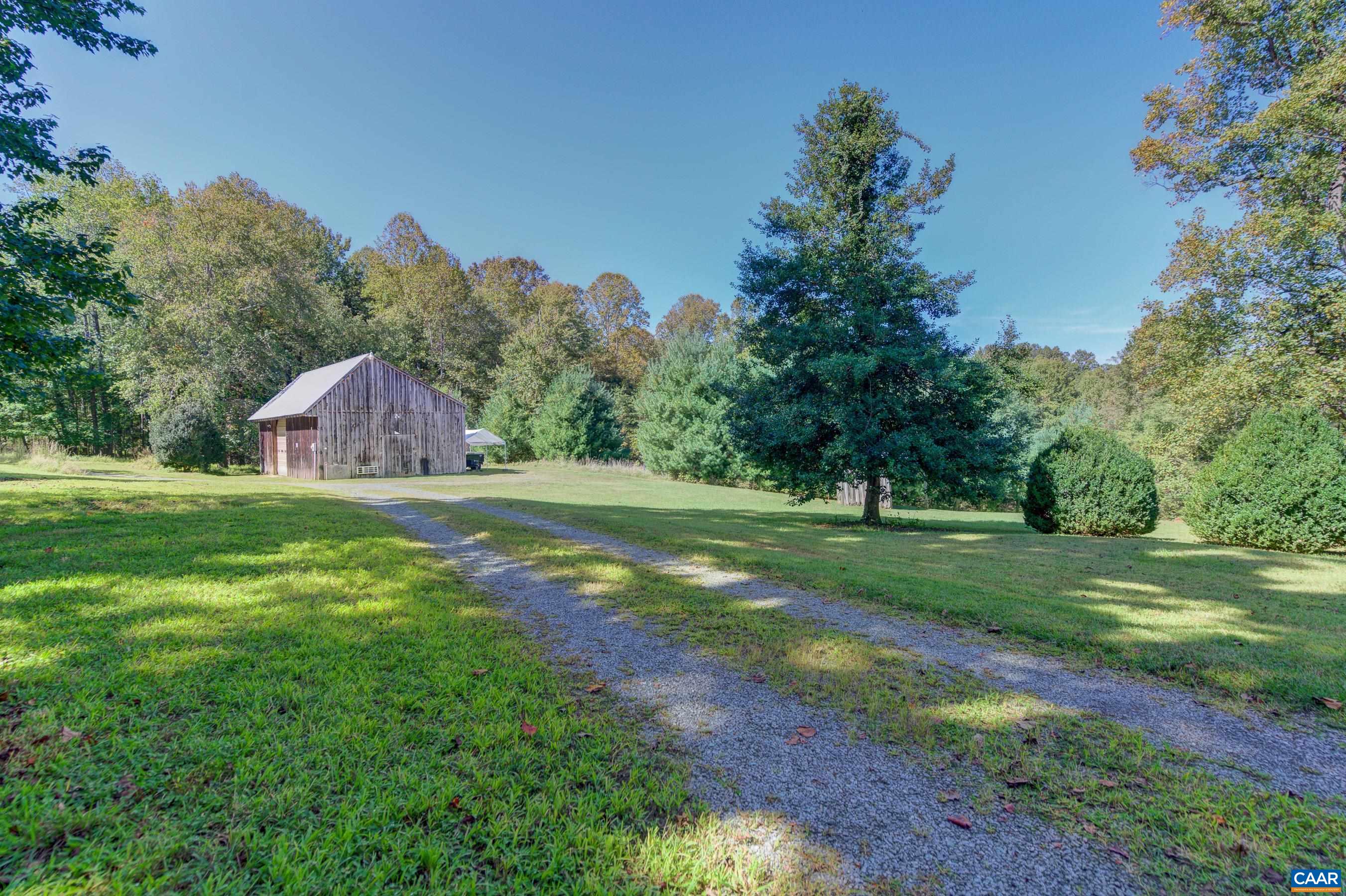 1265 Pounding Creek Road Charlottesville, VA 22903 - Photo 71 of 71 a house view with a garden space