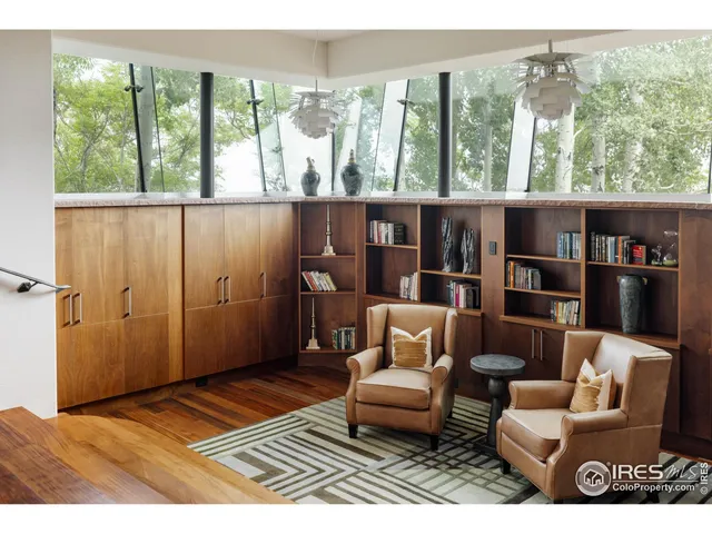 a outdoor living space with furniture and a rug